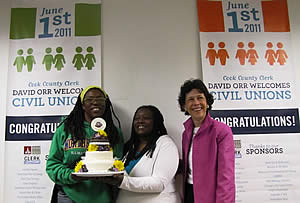 Lakeesha Harris and Janean Watkins pose with MWRD Commissioner Debra Shore