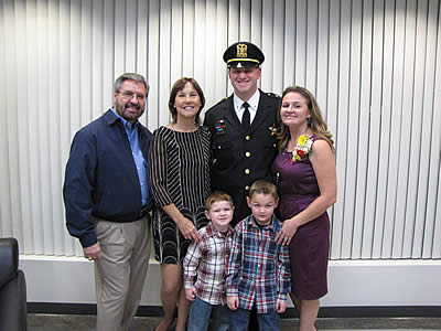 Commander Brian Rzyski and family