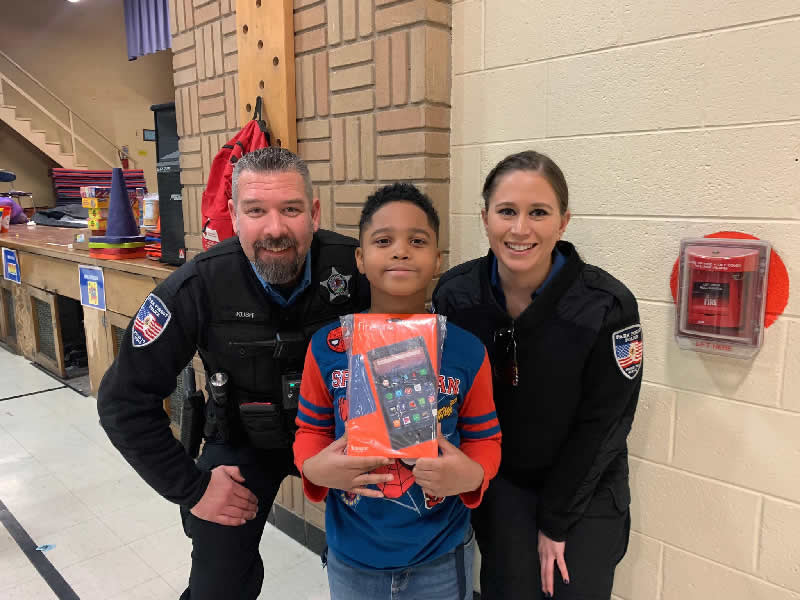 Officer Kush and CEC Rachel Wax with Talala School's Student of the Month
