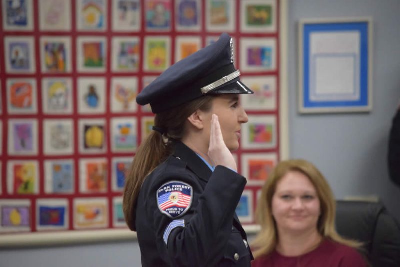 officers promoted, Sergeant Meghan shatters a glass ceiling in Park Forest as she Vold takes the oath of office.