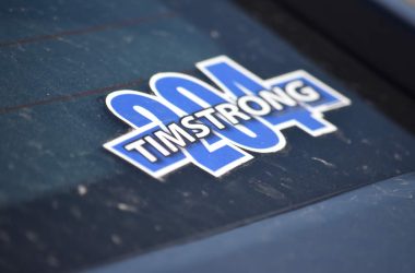 A sticker on the rear window of a car honoring Officer Tim Jones badge number 204. (Photo: Gary Kopycinski)