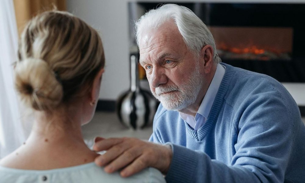 mindfulness training, older man comforts a woman