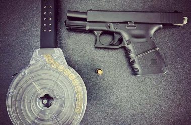 Glock 23 with switch and loaded drum