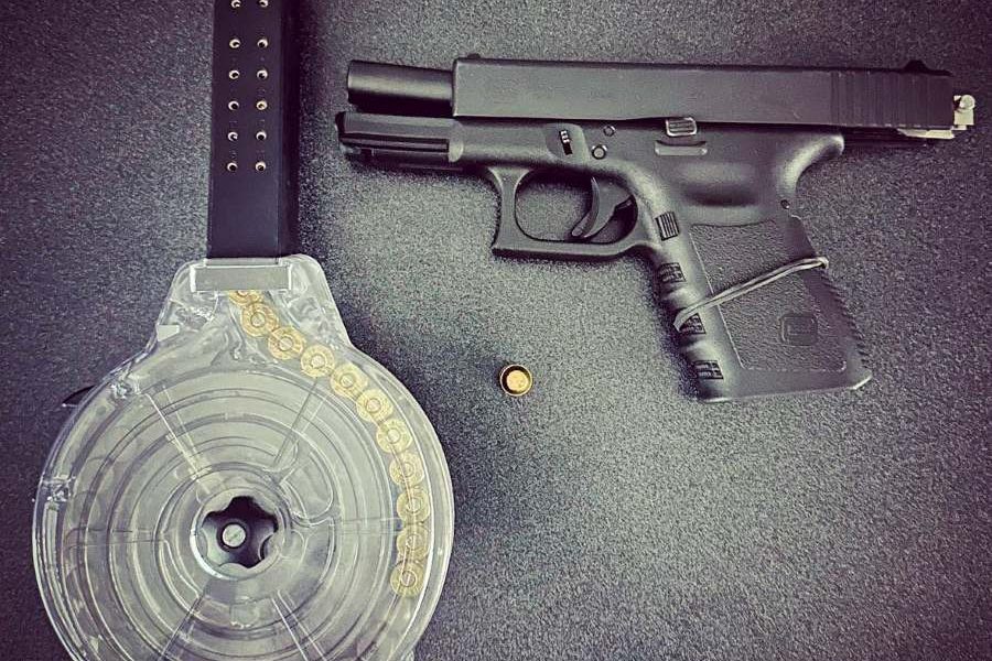 Glock 23 with switch and loaded drum