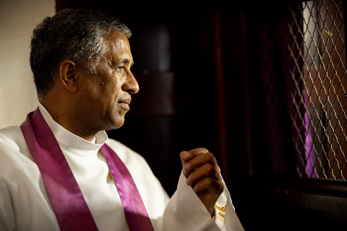 priest hearing confession