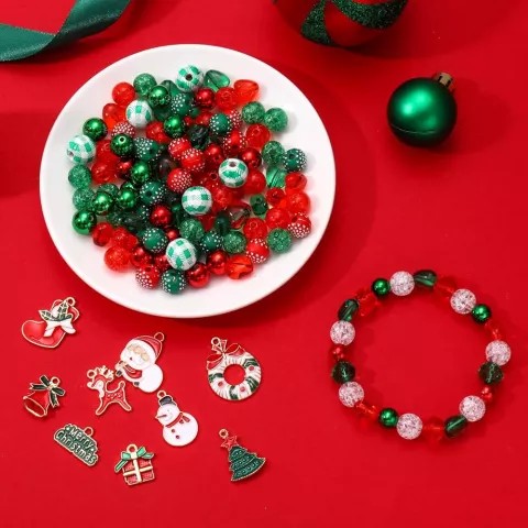 holiday jewelry on a red background with a bowl of craft beads