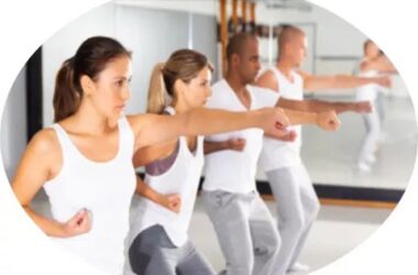 men and women learning self-defenses poses
