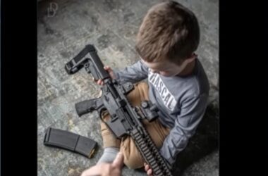 gun industry, advertisement of child holding assault rifle