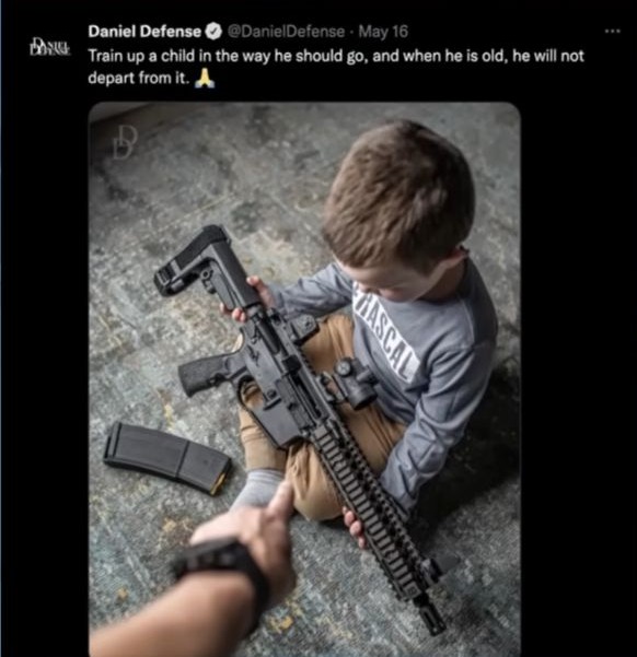 gun industry, advertisement of child holding assault rifle