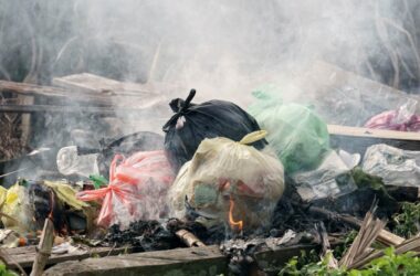 burning garbage, call 911